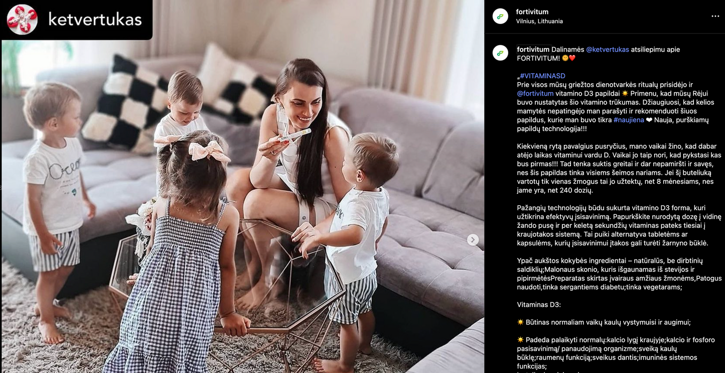 Woman sitting on a couch with four children in a living room.